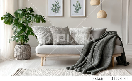Modern Scandinavian Living Room Interior Design with Sofa, Pillows, Plants, and Decorative Elements 131924169