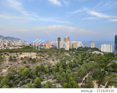 Experience Stunning Coastal Views Overlooking Urban Development Surrounded by Lush Greenery 131926310