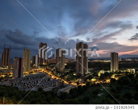 The Stunning Urban Skyline at Dusk Showcases Vibrant City Lights that Captivate the Eye The Stunning Urban Skyline at Dusk Showcases Vibrant City Lights that Captivate the Eye 131926345