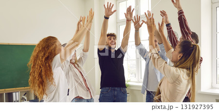 Team of happy school, college or university students and friends having fun together Team of happy school, college or university students and friends having fun together 131927395