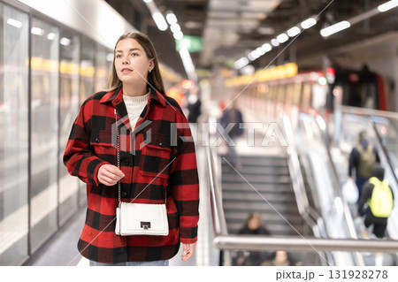 Woman changing to the subway 131928278