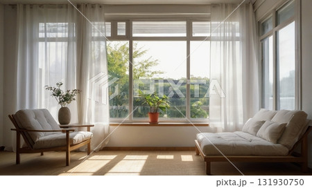 白を基調とした部屋でそよ風に包まれ読書を楽しむ女子大生の午後 白を基調とした部屋でそよ風に包まれ読書を楽しむ女子大生の午後 131930750