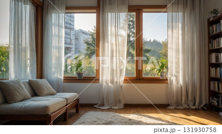 白を基調とした部屋でそよ風に包まれ読書を楽しむ女子大生の午後 131930758