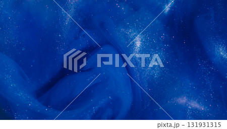 Shiny ink. Blue glitter splash. Defocused cosmic color bright texture creative acrylic cloud spreading on abstract bokeh background. Shiny ink. Blue glitter splash. Defocused cosmic color bright texture creative acrylic cloud spreading on abstract bokeh background. 131931315