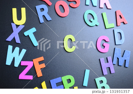 colorful letter alphabet on black background, object for education 131931357