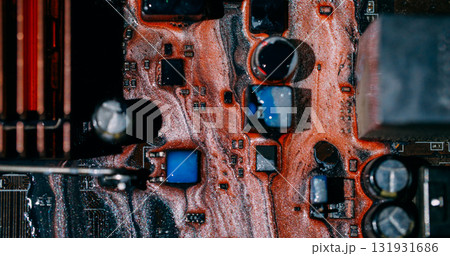 Paint drip. Electronic abstraction. Defocused orange blue colorful digital technology dark black glitter microchip water texture on art background. 131931686