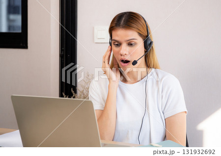 Professional young business woman working and meeting online in modern home office. 131932692