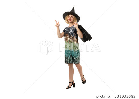 Woman in sequin dress prepares for Halloween, isolated on white, PNG Woman in sequin dress prepares for Halloween, isolated on white, PNG 131933685