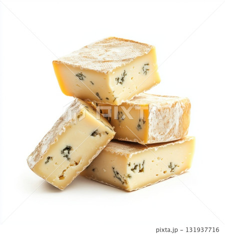 Cheese blocks arranged on a white surface showcasing a flavorful blue cheese variety Cheese blocks arranged on a white surface showcasing a flavorful blue cheese variety 131937716
