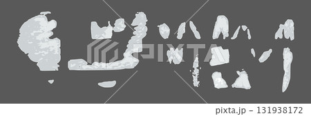 Set of white fragments of torn and ripped paper with adhesive residue on wall 131938172