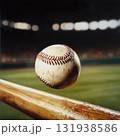 Baseball in mid-air near a wooden bat at a stadium during a bright daytime game 131938586