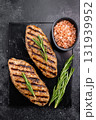 Grilled lula kebabs, perfect for an authentic Middle Eastern feast. black background. top view 131939952