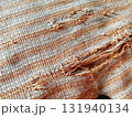 Torn fabric. Frayed cloth background for sample, presentation, safety issue, excessive acid wash warning etc 131940134