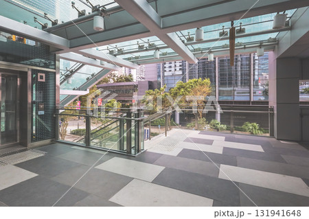Oct 4 2025 Modern Urban Atrium With Glass Ceiling Overlooking City Streets 131941648