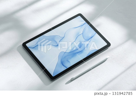Customizable tablet screen mockup placed on a bright surface with a stylus pen, perfect for showcasing digital art or app designs Customizable tablet screen mockup placed on a bright surface with a stylus pen, perfect for showcasing digital art or app designs 131942785