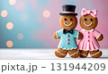 クリスマス　おしゃれした可愛いジンジャーブレッドマンクッキーのカップル 131944209