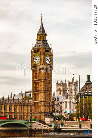 Vertical view of Elizabeth Tower and Palace of Westminster with Westminster Bridge over River Thames in London 131945729