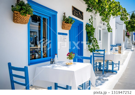 Traditional greek island town cafe al fresco dining Traditional greek island town cafe al fresco dining 131947252