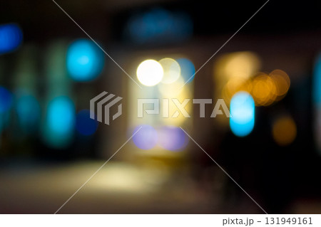 abstract christmas background. blurred city street lights at night. defocused photo. winter holiday concept. festive urban scene backdrop of uzhhorod with bokeh effect. bright and colorful circular abstract christmas background. blurred city street lights at night. defocused photo. winter holiday concept. festive urban scene backdrop of uzhhorod with bokeh effect. bright and colorful circular 131949161