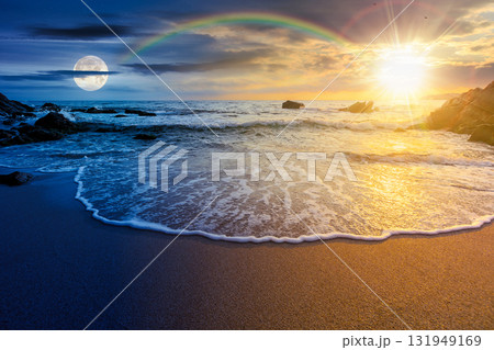 seascape on summer solstice at twilight. sea beach landscape beneath a sky with sun and moon. day and night time change concept. purity in nature. celebrating midsummer pagan holiday at the sea 131949169