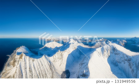 Flight over the mountains. Scandinavia. Aerial view on the Lofoten Islands, Norway. 131949556