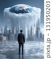 Businessman Contemplating a Melting Planet Earth and the Climate Crisis 131950203