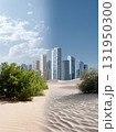 Modern City Skyline with desert sand dunes in the foreground 131950300