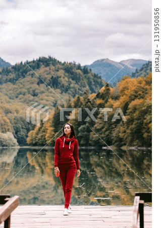 beautiful woman relax in autumn forest 131950856