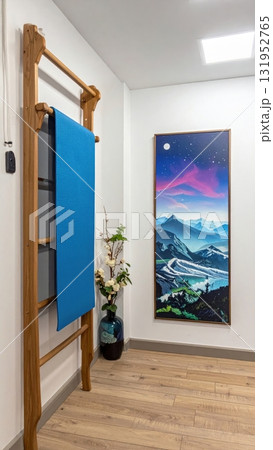 Fashion sale merchandise: colorful clothes hanging on a clothesline with paper shopping bags in a customer's hand Fashion sale merchandise: colorful clothes hanging on a clothesline with paper shopping bags in a customer's hand 131952765