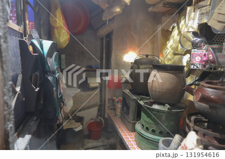 Cozy Rustic Kitchen Workshop With Vintage Pots 131954616