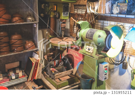 Sept 27 2025 Industrial Workshop With Grinding Machine And Tools In A Busy Craft Shop Sept 27 2025 Industrial Workshop With Grinding Machine And Tools In A Busy Craft Shop 131955211