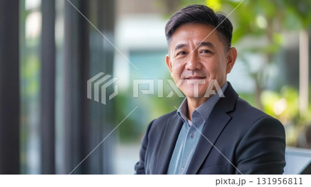 Confident Asian businessman portrait. Confident Asian businessman portrait. 131956811