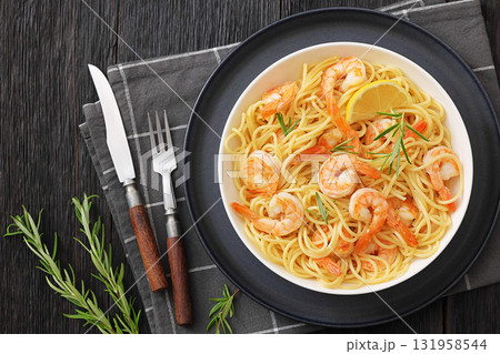 yummy spaghetti with shrimps in a white bowl yummy spaghetti with shrimps in a white bowl 131958544