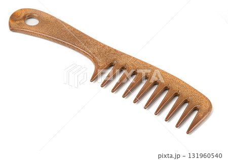 Brown wide tooth comb for detangling hair 131960540