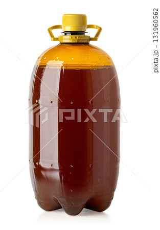 Fresh beer in large plastic growler bottle 131960562
