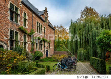 Bikes and brick houses in Groot Begijnhof Leuven Bikes and brick houses in Groot Begijnhof Leuven 131960574