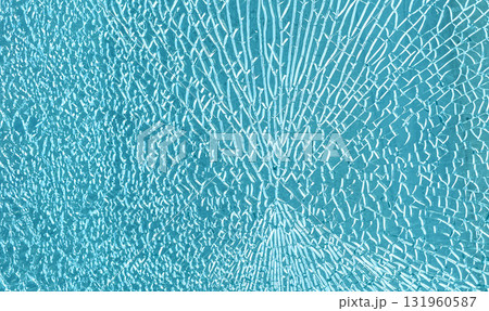 Shattered blue tempered glass texture with breaking lines 131960587