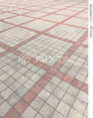 Pavement floor pattern with red intersecting lines 131960590