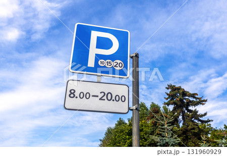 Paid parking road sign against the sky 131960929