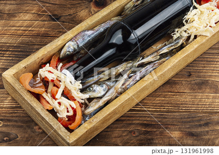 Beer and dried fish. 131961998