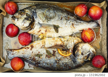Roasted whole sea bream fish or dorado, close up. 131962002
