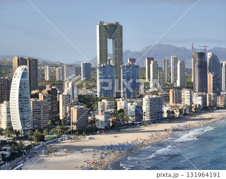 A stunning Coastal Cityscape showcasing Modern Architecture alongside a beautiful beach view A stunning Coastal Cityscape showcasing Modern Architecture alongside a beautiful beach view 131964191