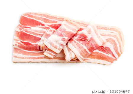 Slices of raw bacon isolated on white background. Slices of raw bacon isolated on white background. 131964677