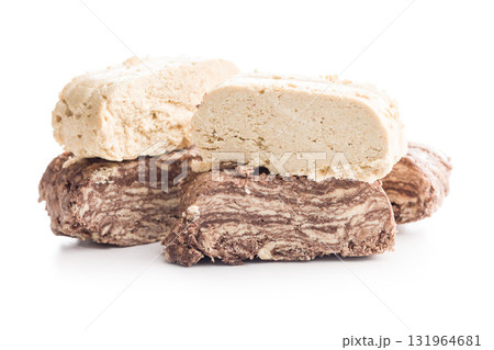 Halva with cocoa. Sweet oriental dessert isolated on white background. 131964681
