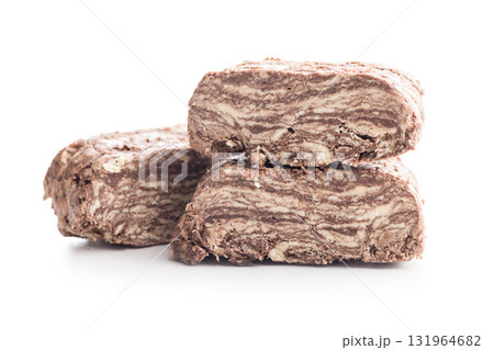 Halva with cocoa. Sweet oriental dessert isolated on white background. 131964682