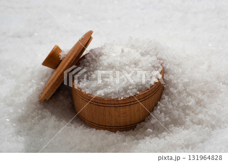 Close up of sea salt in a wooden bowl Close up of sea salt in a wooden bowl 131964828