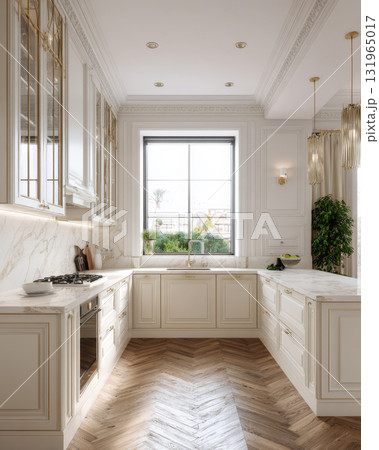 Elegant kitchen interior with a neo-classical design, featuring a harmonious blend of creamy cabinetry, striking white marble countertops with gold veins, and a classic herringbone wood floor 131965017