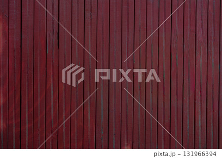 Dark red wooden wall with vertical planks, subtle natural texture, showcasing weathered wood surface in moody trendy color of year. Concept of wood texture, rustic background, vintage atmosphere Dark red wooden wall with vertical planks, subtle natural texture, showcasing weathered wood surface in moody trendy color of year. Concept of wood texture, rustic background, vintage atmosphere 131966394