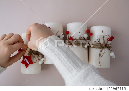 Handmade Christmas countdown advent four-week calendar. Festive holiday preparation craft master class of creative making decor. Hands-on activities sustainable responsible holiday gift workshop 131967516