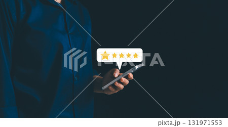 Businesswoman holding smartphone with floating customer review icons and star ratings, concept of online feedback, digital marketing, reputation management, customer satisfaction. satisfaction 131971553